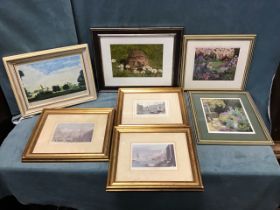 A set of three gilt framed Venetian prints; a pair of Andrew Bates signed floral garden prints;