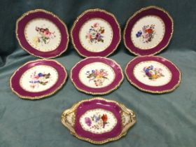 A nineteenth century Spode porcelain dessert set handpainted with polychrome floral sprigs framed by