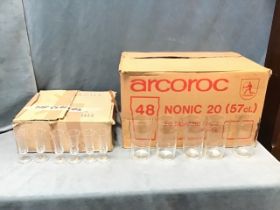 A box of 36 waisted Elgin sherry schooners; and a box of 44 French Arcoroc pint glasses. (2)