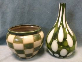 An olive green bottle shaped art glass vase with ovoid white inclusions; and a green & white