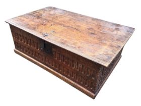 A 17th century oak bible box, the rectangular chip carved top with original iron strap hinges and