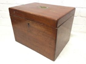 A nineteenth century rectangular mahogany box with brass military handle to hinged lid, the interior