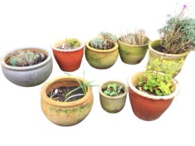 Eight circular miscellaneous stoneware & terracotta garden pots - salt glazed, cauldron shaped, flat