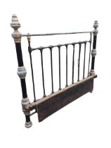 A Victorian brass & iron bedstead, the vertical bars with scrolled mounts beneath a brass covered