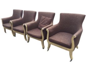 A set of four regency style Julian Chichester giltwood upholstered library armchairs, the flared