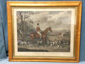 After William Webb, handcoloured aquatint, huntsman with hounds in landscape, titled John Mytton