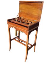 An Edwardian mahogany cased glockenspiel dinner gong, the moulded box top enclosing five brass