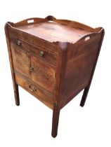 A Georgian mahogany cabinet, the rectangular tray top with shaped gallery and pierced handles