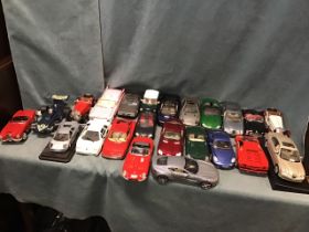 A collection of 1/18 scale classic cars by Maisto, Burago,Tonka & Corgi - Cadillac, Ferraris,