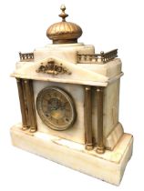 A Victorian white marble architectural mantle clock, with domed cupola above brass galleries and