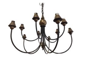 A modern ten-light chandelier, the column with painted conical patinated brass ball finials,