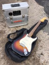 A soft cased Vintage Reissued Series electric Fender strat style guitar with three Wilkinson pick-