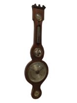 A Victorian rosewood banjo barometer, the swan-neck pediment above a shaped case with a hygrometer