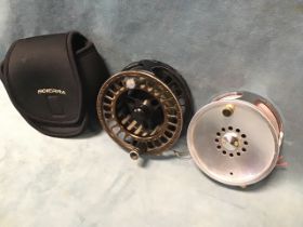 A cased Scierra TX2 4.5in salmon fly reel with backing line; and a Vision 4in Tank salmon fly reel