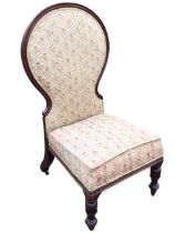 A Victorian mahogany balloon back side chair, the upholstered back and rectangular seat raised on
