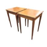 A pair of Georgian style mahogany lamp tables with square reeded edge gilt tooled leather tops above