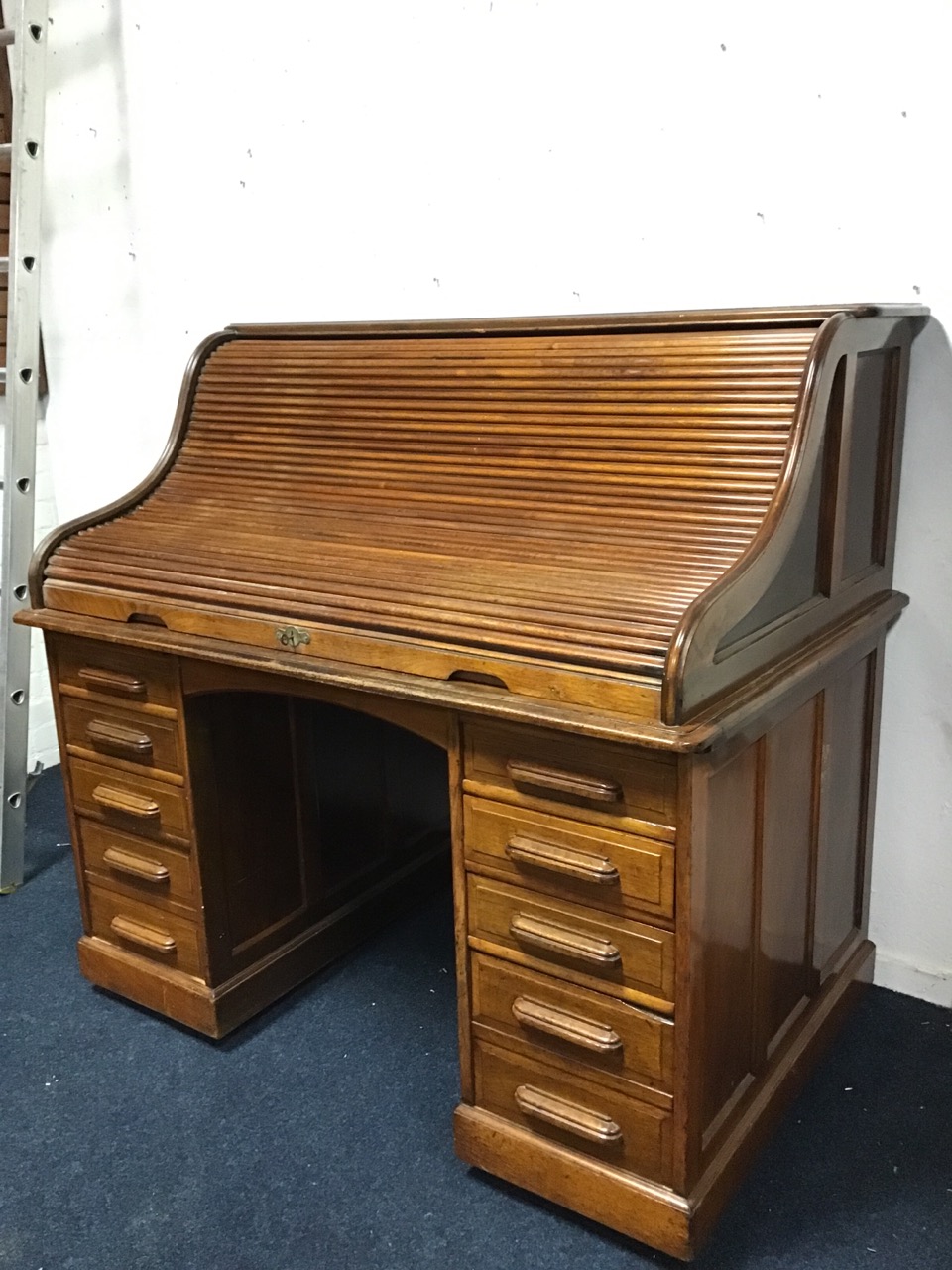 An Edwardian mahogany rolltop desk with panelled sides and tambour front enclosing pigeonholes and - Image 3 of 3