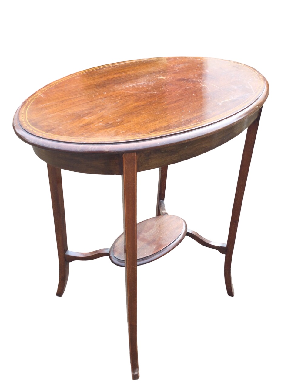 An Edwardian mahogany occasional table with oval moulded chequer strung top raised on square
