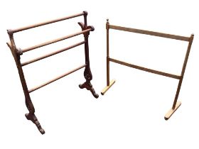 A Victorian mahogany towel rail with shaped pierced trestle style supports; and an Edwardian