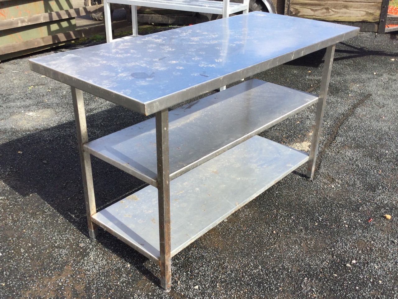 A rectangular stainless steel counter with platform top and two shelves below, supported on square - Image 3 of 3