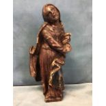 A C16th German carved and polychrome painted figure of Mary mater dolorosa, depicted with clasped