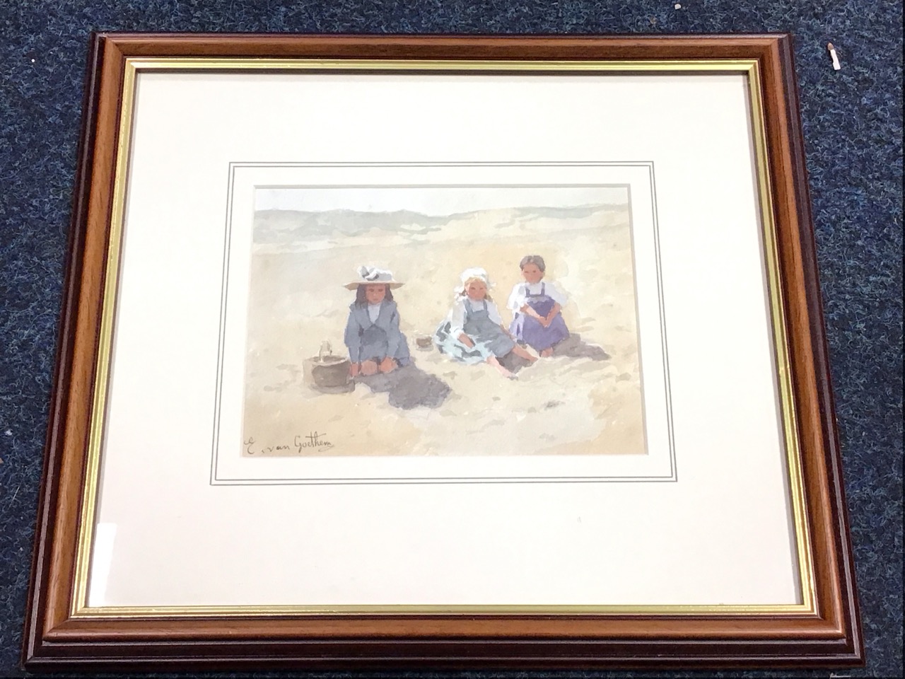Edward Van Goethem, watercolour, children seated on the beach, signed, mounted & framed. (7in x 5.