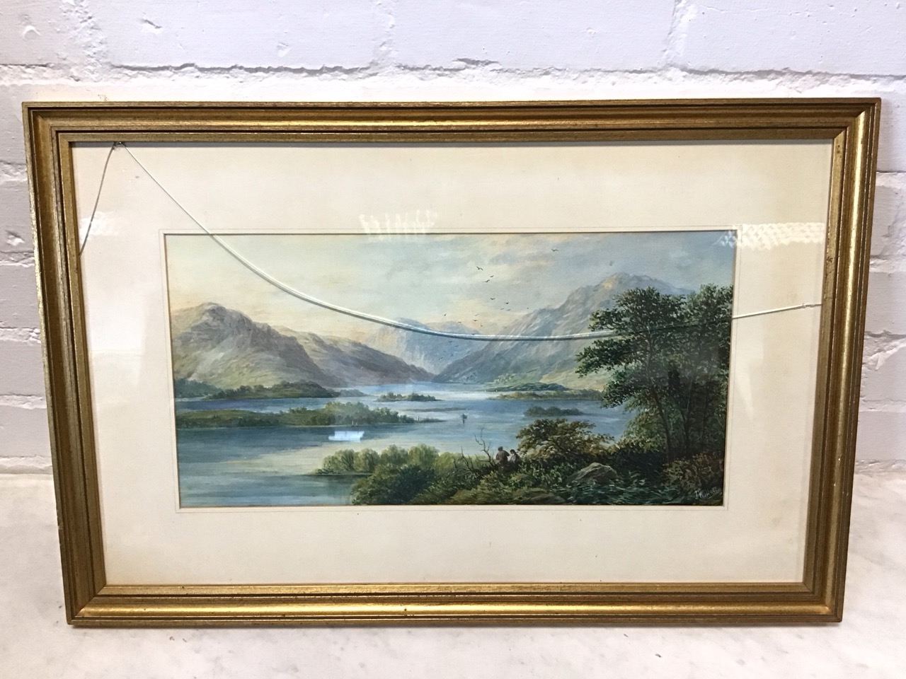 J Wallace, C19th watercolour, lake landscape with figures in foreground, signed, mounted & gilt