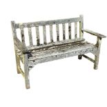 A 4ft Lister Burmese teak garden bench of slatted construction with platform arms, raised on