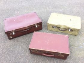 A Phoenix faux snakeskin suitcase with chromed fittings; a Dreadnought fibreboard suitcase; and