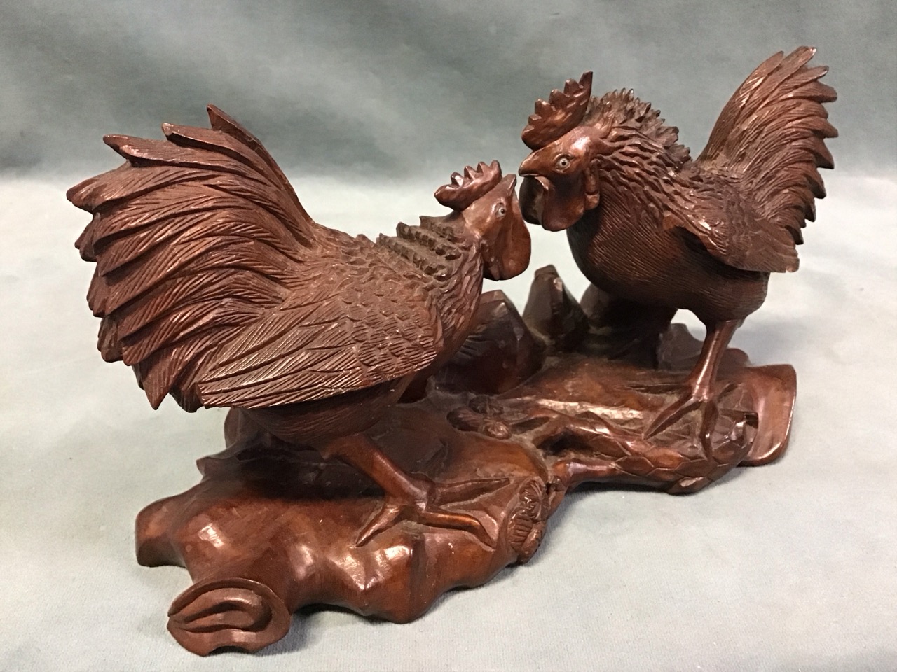 A Chinese carved hardwood figure of two duelling cockerels with glass inset eyes, on a - Image 3 of 3