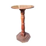 An oak & pine pedestal table with circular top on bulbous turned column above an octagonal stepped
