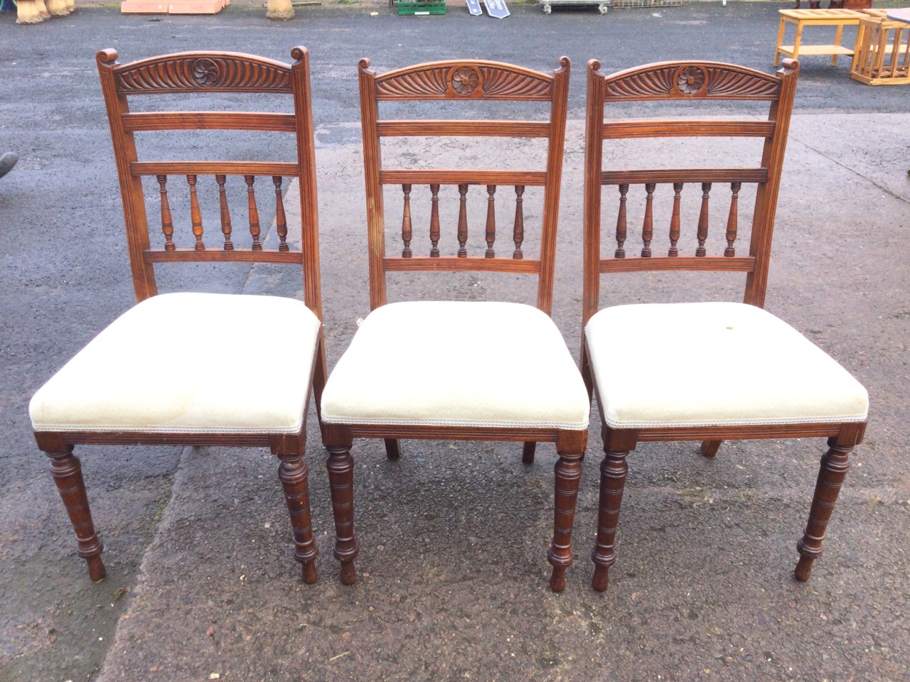 A set of three Edwardian mahogany chairs with arched gadrooned carved backs and central - Image 2 of 3