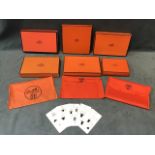 A collection of six Hermès boxes of various sizes; three orange canvas pouches with the Hermès logo;