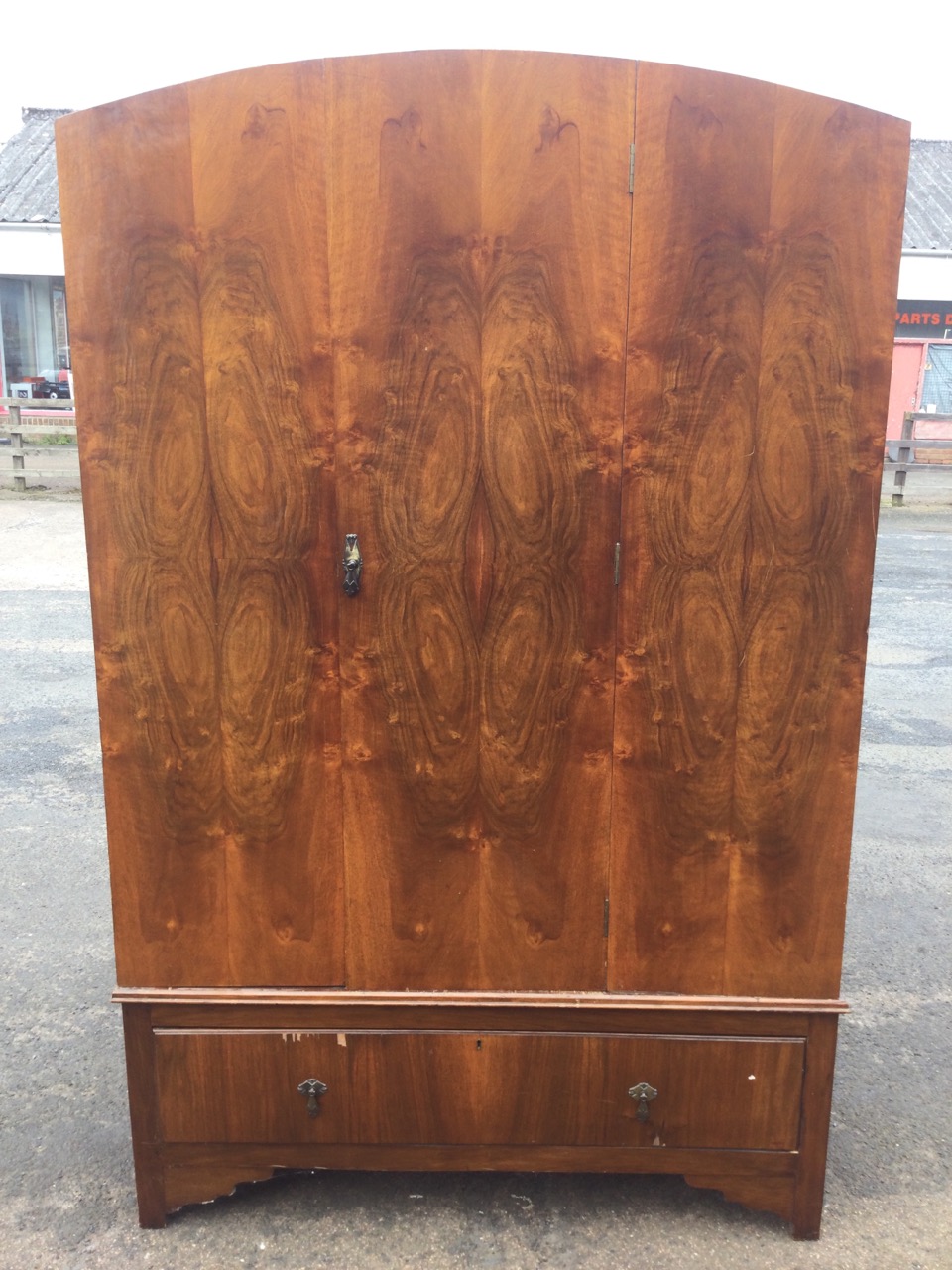 An arched 30s walnut wardrobe with central door and internal full length mirror above a moulded base - Image 2 of 3