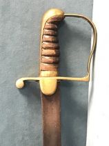 A 1797 pattern Prussian Light Cavalry sabre with brass hilts and ribbed wood grip. (23.5in)