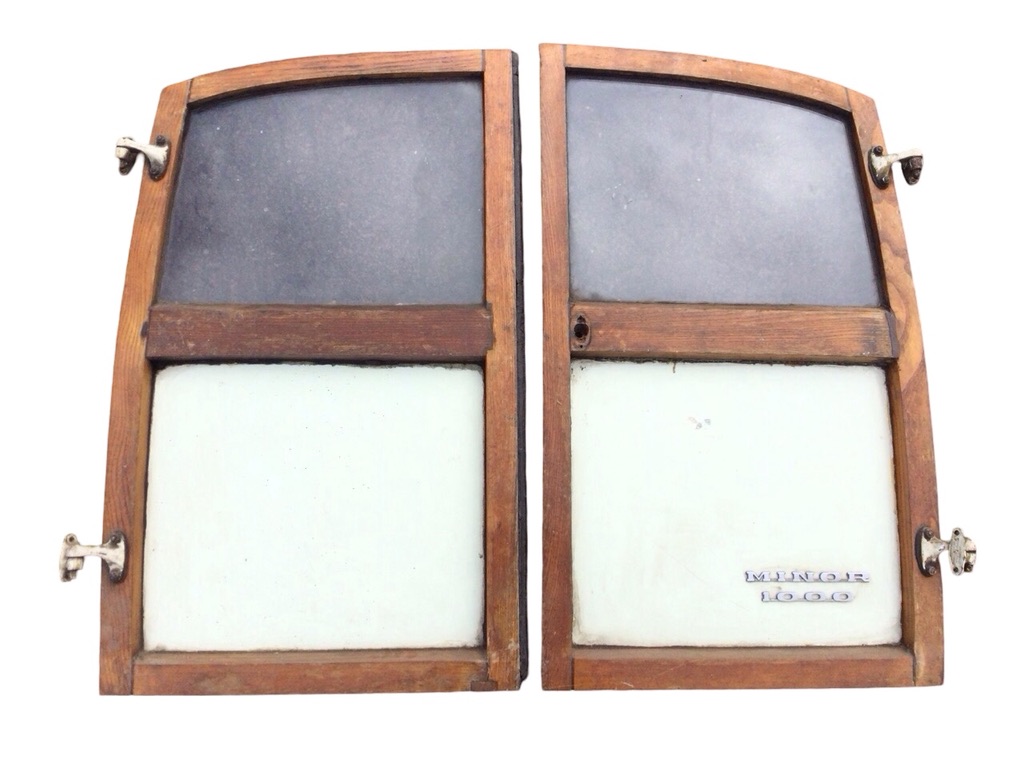 A pair of Morris Traveller rear doors with metal and glazed panels in shaped oak frames, complete