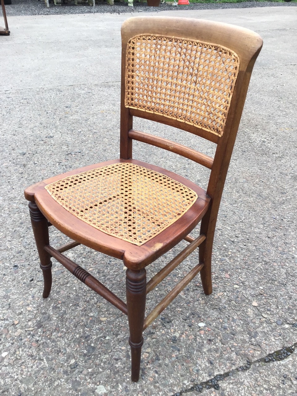A Victorian mahogany childs chair with arched caned back and bowfronted seat, raised on turned - Image 3 of 3