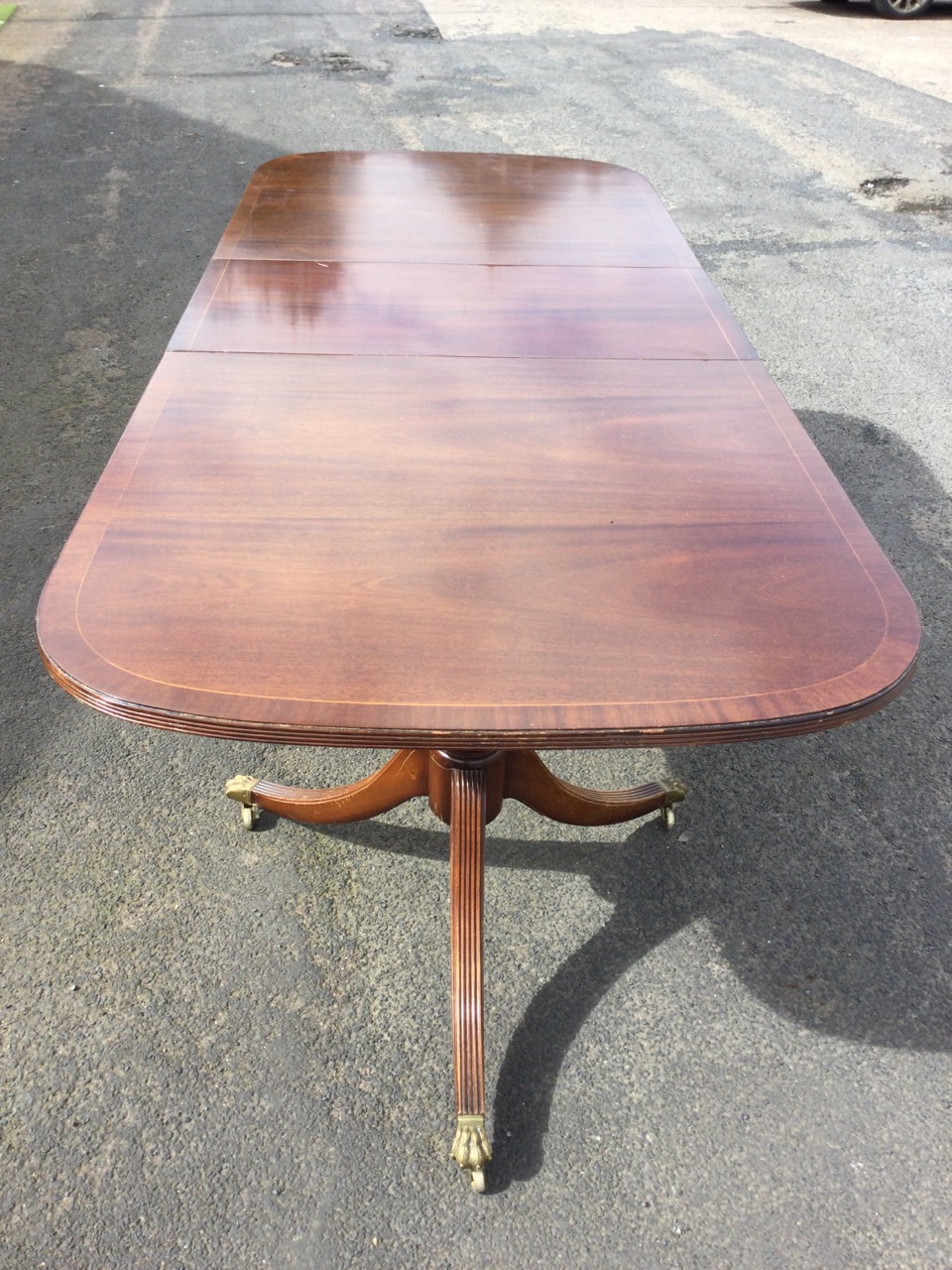 A regency style mahogany twin pedestal dining table with crossbanded reeded edged rounded - Image 2 of 3