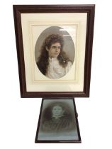 A Victorian oval chromolithograph of a young woman with curly hair, mounted & framed - 16.75in x