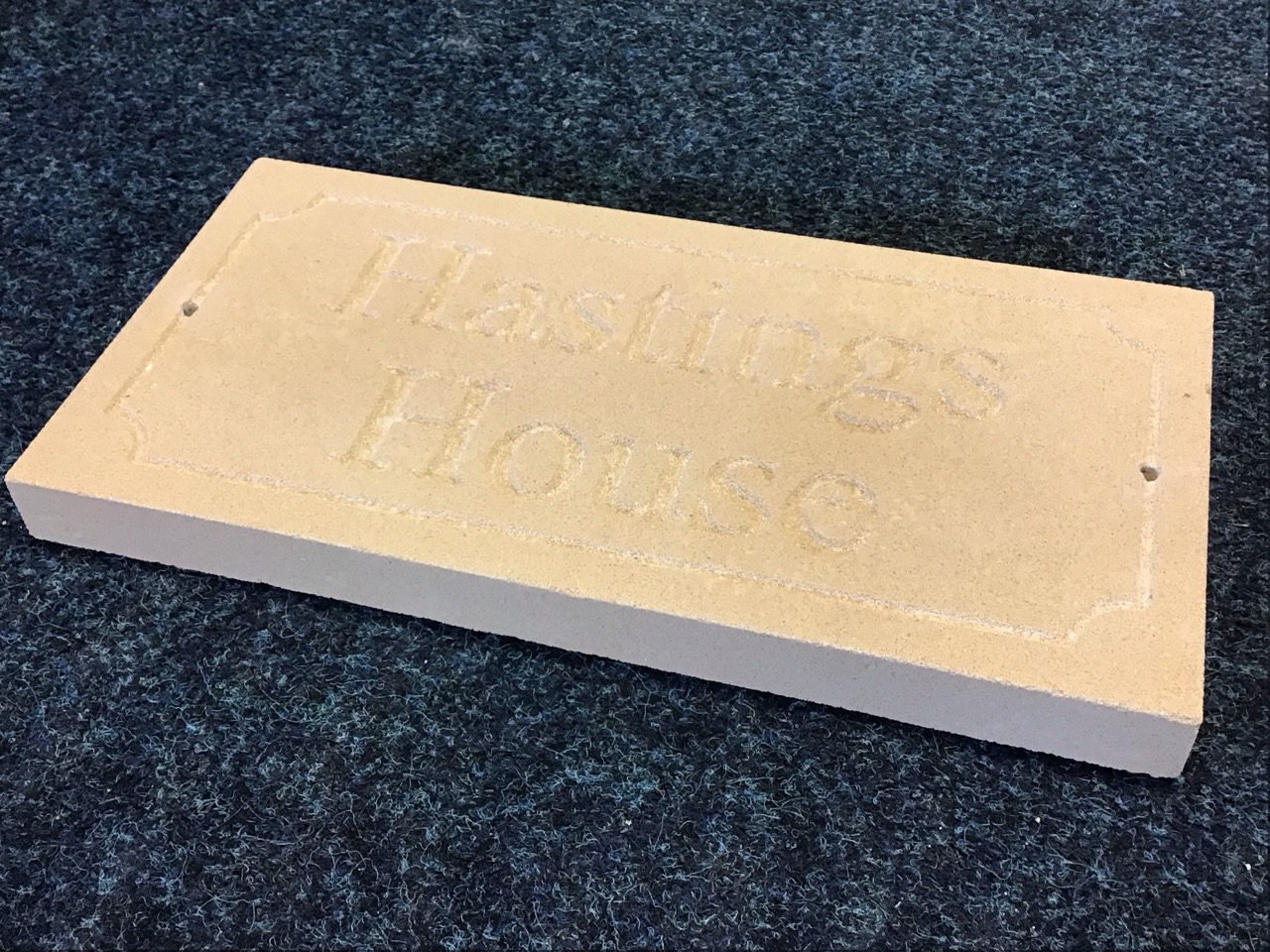 A sandstone slab carved with house name in panel - Hastings House. (15.75in x 8in) - Image 2 of 3