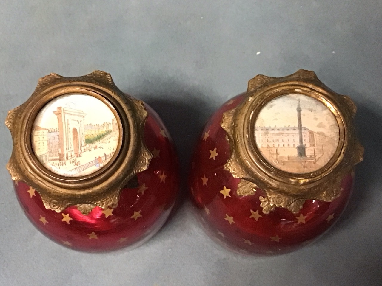 A pair of Victorian cranberry glass Palais Royal scent bottles of domed form having giltmetal - Image 2 of 3