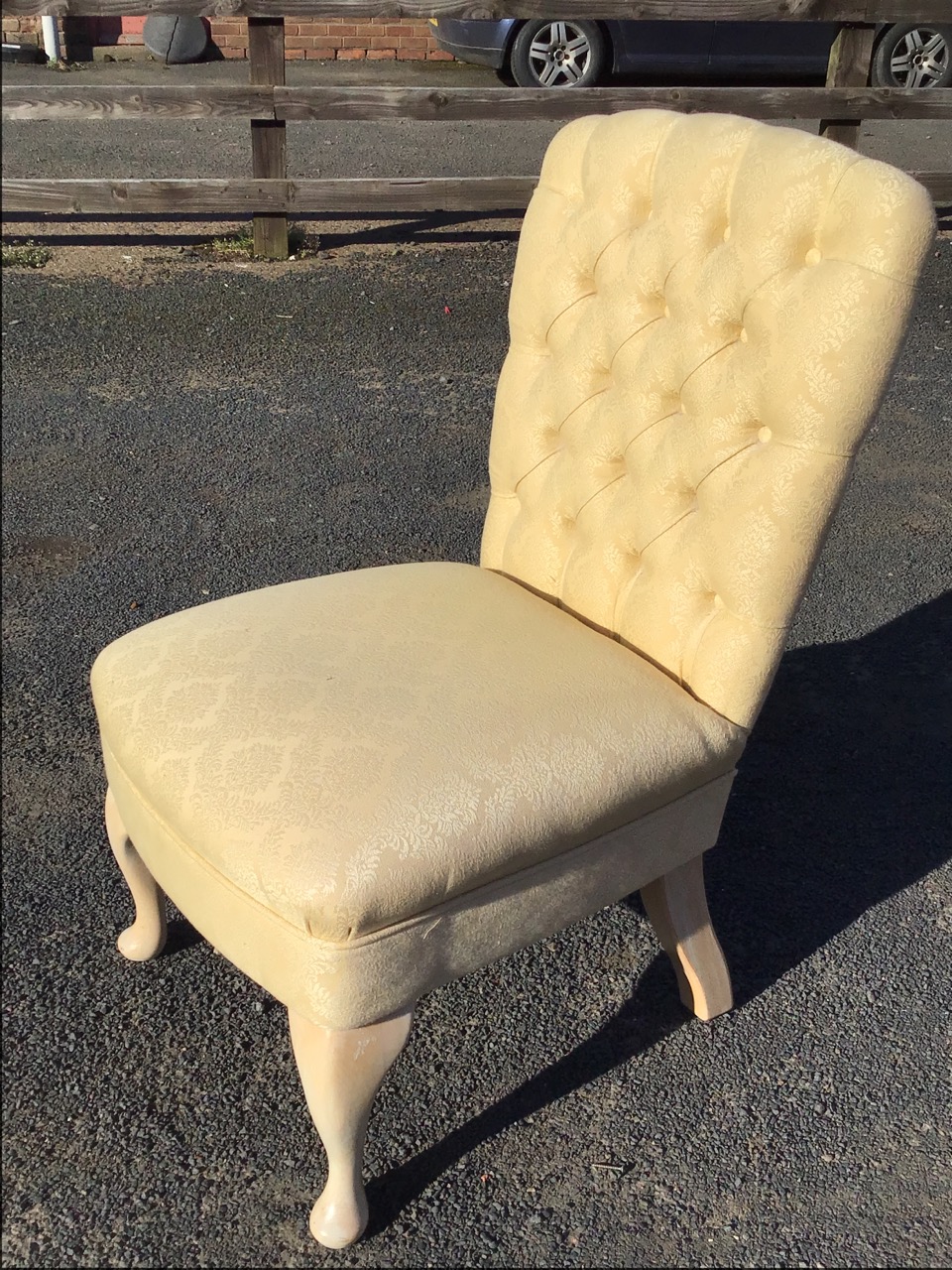 An upholstered chair with buttoned back and flared rectangular roundel seat raised on cabriole legs. - Image 3 of 3
