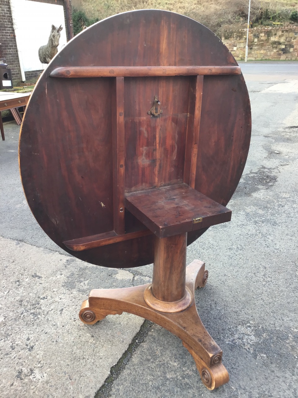 A William IV mahogany breakfast table, the circular top tilting on a tapering column, raised on a - Image 3 of 3