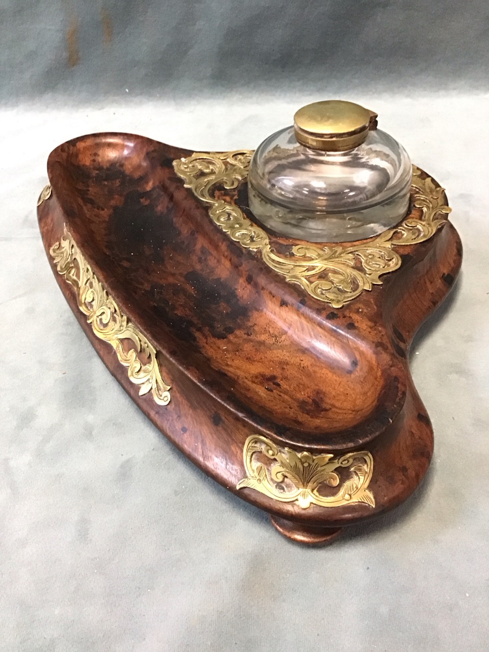 A Victorian walnut inkstand, with circular glass inkwell on a solid carved base with shaped pen - Image 3 of 3