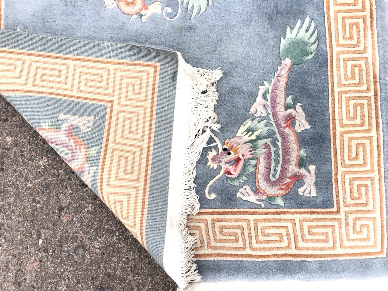 A Chinese rectangular wool rug with central medallion of dragons chasing the pearl and dragon - Image 3 of 3