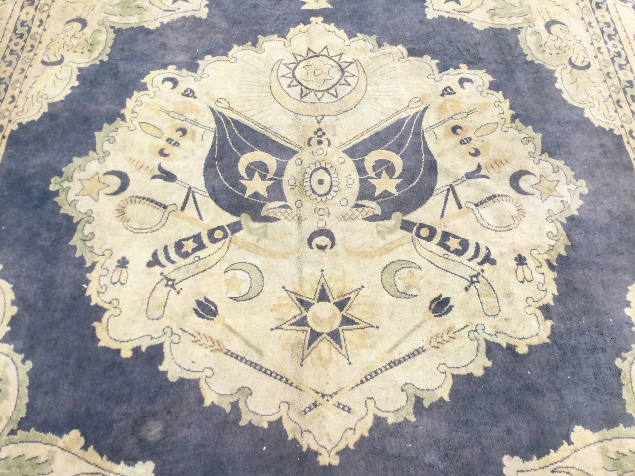 A Turkish wool carpet woven with central medallion of national flags & symbols and military - Image 2 of 3