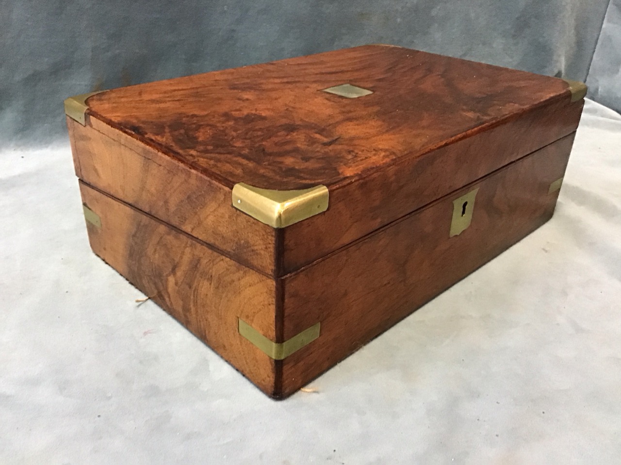 A Victorian brass bound walnut writing slope with brass shield plaque to top having interior with - Image 3 of 3