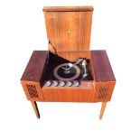 A 60s mahogany HMV stereo record player with perspex control panel and brushed aluminium knobs