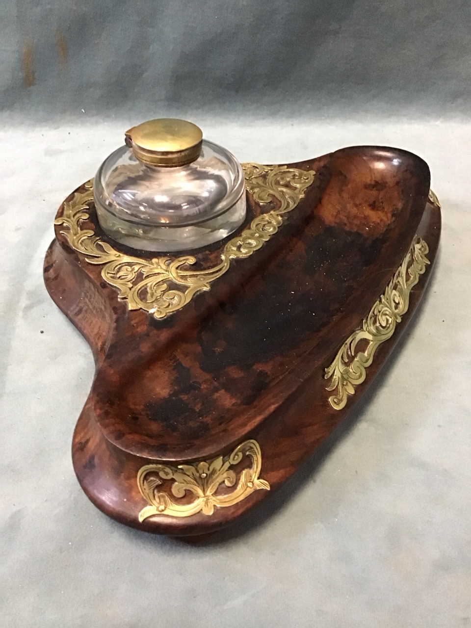 A Victorian walnut inkstand, with circular glass inkwell on a solid carved base with shaped pen - Image 2 of 3