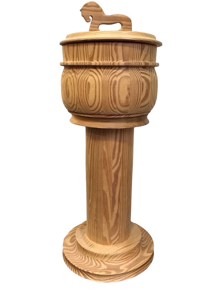 A Norwegian pine font with urn shaped vessel on column, the turned cover with horse fretwork handle,